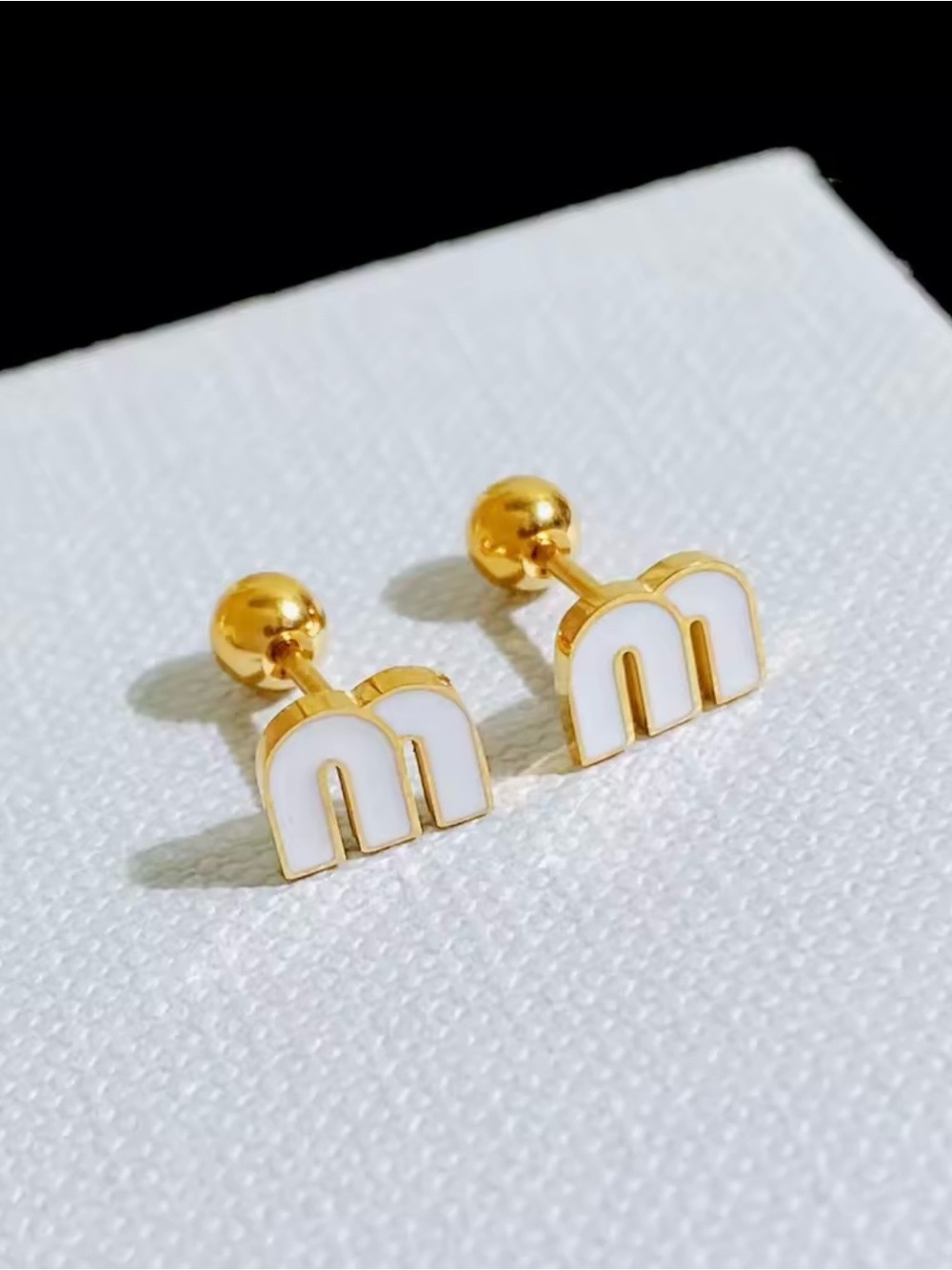 Gold and White 'm' Stud Earrings